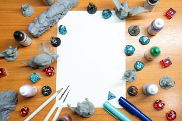 Blank white paper place with miniatures and dice role playing tabletop game and board game mockup