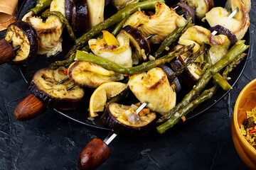 White fish fillet with asparagus, yummy grilled tilapias.