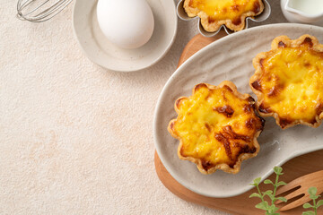 Delicious puff pastry Portuguese egg tart Pastel de nata in flower shape.