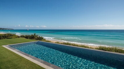 Swimming pool overlooking the vast ocean horizon, capturing the serene blend of sparkling blue water, gentle waves, and endless sky, evoking relaxation, luxury, and a peaceful coastal retreat atmosphe