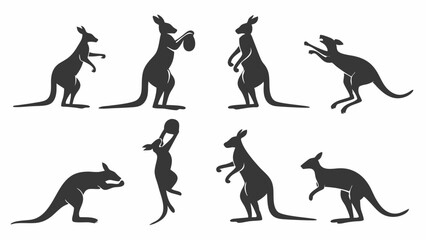 Fototapeta premium Collection of eight black kangaroo silhouettes in various dynamic poses, including jumping, standing, and boxing. Detailed vector graphic of Australian marsupial movements.