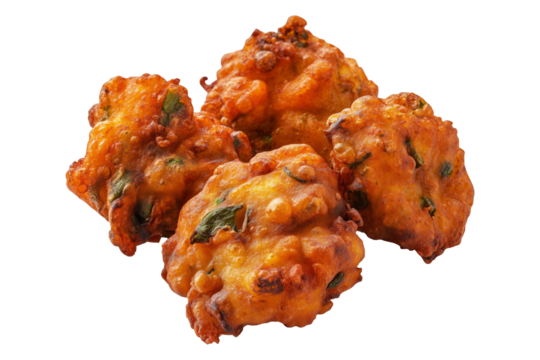Crispy golden vegetable Indian fritters Pakoras with herbs, isolated on white transparent background, concept of traditional snack