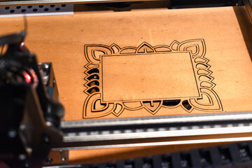 Laser engraving and cutting, using reclaimed wood, upcycling concept