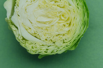 Closeup of halved cabbage showing detailed leaf structure