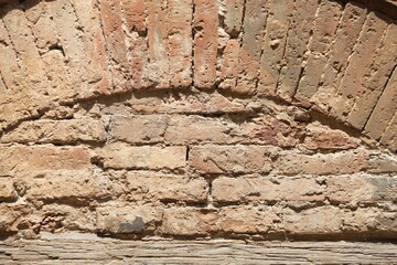 close up of brick wall texture of and historic building in Siena, Italy
