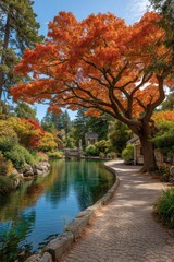 Stunning Autumn Landscape Featuring a Tree with Orange Leaves at the Center of a Tranquil Pond
