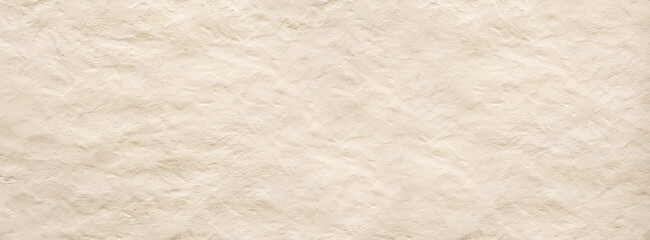 Beige rough concrete wall texture creating an industrial background