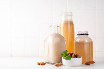 Homemade almond Orgeat Syrup in different bottles