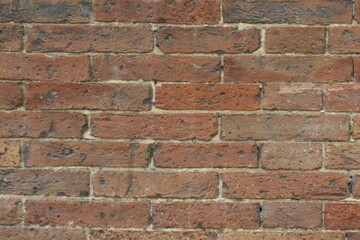 close up of brick wall texture of and historic building in Siena, Italy
