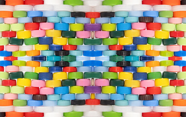overlay rows of the Recycled Multicolored Plastic Bottle Caps