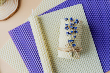 Lavender bunch and beeswax sheet prepared for candle making