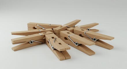 Wooden Clothespins Arranged in a Starburst Pattern on White Background