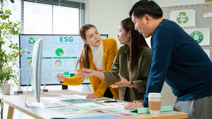 Asian business team discussion reusable product in office,start up eco-friendly business,environmental protection,sustainable business model,ESG strategy,sustainability,team meeting,ESG Report concept