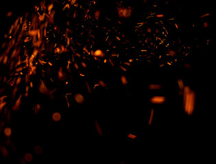 A black background with a lot of fire and smoke