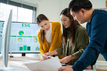 Asian business team discussion reusable product in office,start up eco-friendly business,environmental protection,sustainable business model,ESG strategy,sustainability,team meeting,ESG Report concept