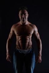 male model - fitness addicted shot in studio background
