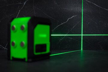 Laser level when building a wall of blocks. laser level for determining precise lines and levels at construction sites