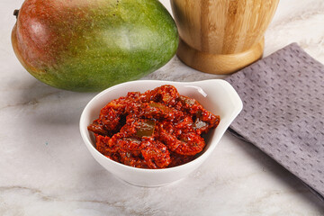 Spicy pickled raw green mango