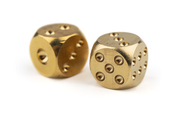 Two golden dice on white background