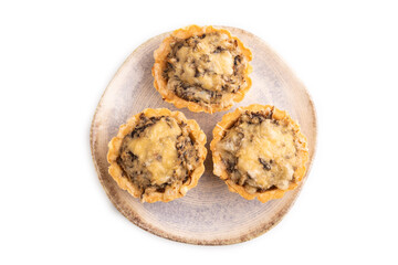 Tartlets with meat and cheese isolated on white. top view, flat lay, copy space