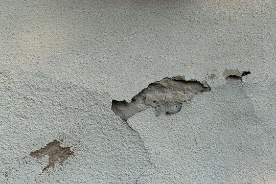 Texture of old grey plaster, wall