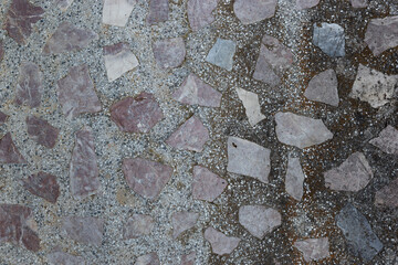 Natural texture of old concrete wall with stone inclusions