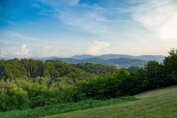 Landscape with low mountains in western Serbia. Summer evening.