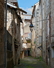 shabby backyard with old desolate residential buildings in Souillac in the region Perigord, France