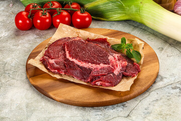 Raw beef cheeks cut for cooking