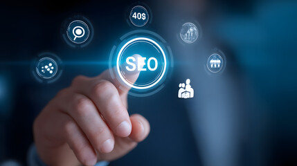 A close-up of a male professional's hand selecting an SEO icon in a digital interface, showcasing modern technology and marketing strategies.