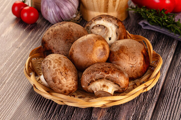 Raw brown champignon heap for cooking