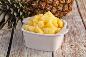 Sweet canned pineapple fruit pieces