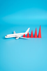 Airplane and growth chart. Increase in passenger traffic. Growth in civil aviation, travel demand, or tourism recovery. Investment in airlines, airport expansion, or global mobility trends.