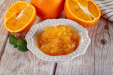 Sweet orange jam in the bowl