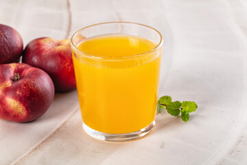 Vitamin beverage - peach juice glass