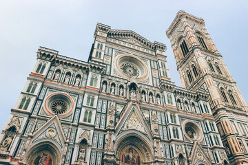 Fototapeta premium facade of the cathedral of florence from bottom with renaissance details architecture