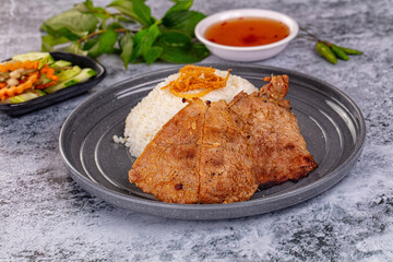 Roasted pork steak with rice