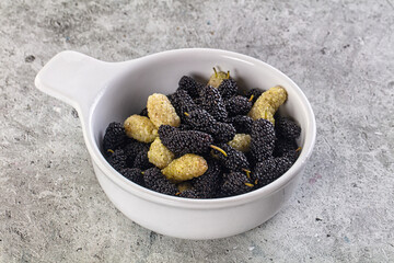 Ripe sweet juicy black and white mullberry