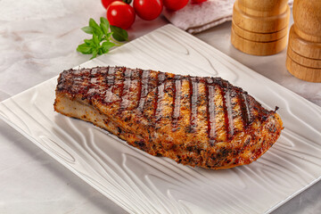 Grilled pork steak with bone