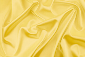 Yellow satin, silk, texture background
