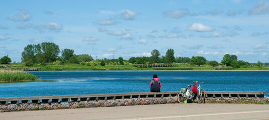 Fishing, relaxation on the lake shore. Panoramic photo. Panoramic photo.
