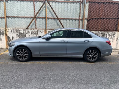 Side of Mercedes Benz C 180 sedan parked on the public park,Selangor,malaysia 29th sept 2024