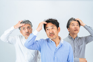 生え際が気になるミドルエイジ男性グループ