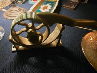 old pharmacy metallic hand circular press
