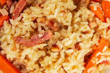 Rice meat and vegetables pilaf fresh delicious gourmet food background on the table rustic food top view copy space