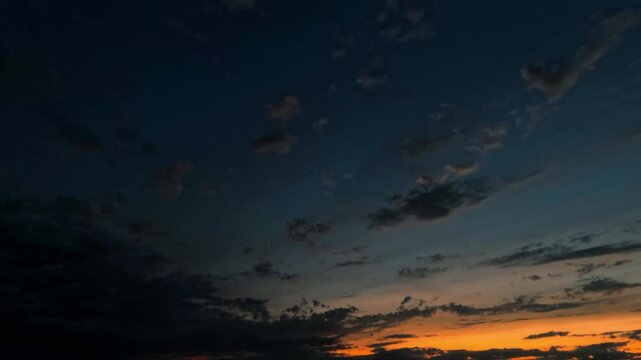 timelapse video with dark clouds at late evening after sunrise