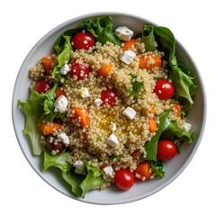 Overhead shot of a quinoa salad with lettuce, tomatoes, carrots, and feta in a white bowl