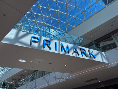 Bratislava, Slovakia, Europe - Jun 21, 2025: a large Primark sign with blue letters on a white background inside a modern shopping mall, concept of retail business, fashion shopping