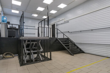 A special room for loading and unloading operations. Stairs and elevator lift.