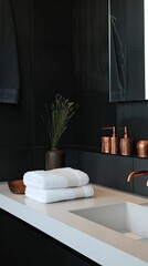 Modern minimalist bathroom, copper accents, white towels.